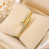Elegant Golden Nail Bracelet with Crystal Accents